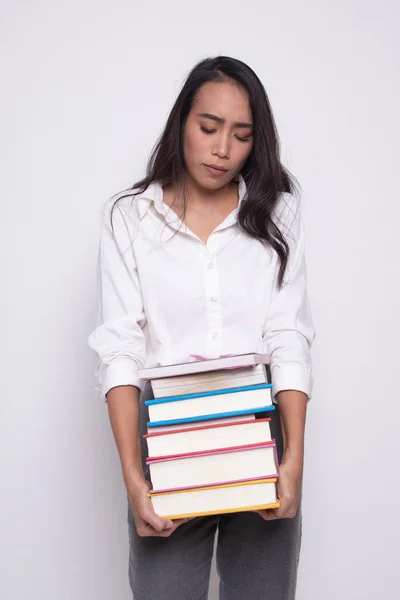 Infelice giovane asiatico donna studiare con maggio libri . — Foto Stock