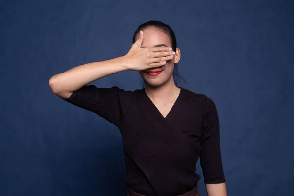 Young Asian woman close her eyes with hand. — Stock Photo, Image