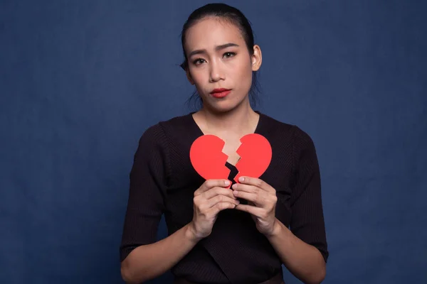 Beautiful young Asian woman with broken heart. | Stock Images Page |  Everypixel