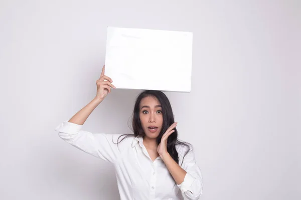 Young Asian woman surprise with white blank sign. — Stock Photo, Image