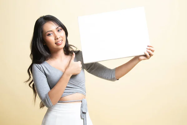 Young Asian Woman Show Thumbs White Blank Sign Beige Background Stock Image