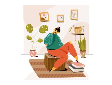 The girl drinking coffe in her home office clipart