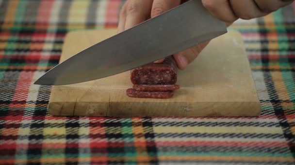 Cutting Traditional Bulgarian Flat Sausage Called Lukanka — Stock Video