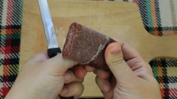 Peeling Skin Traditional Bulgarian Flat Sausage Called Lukanka — Stock Video