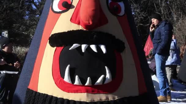 Kukeri - masked people dancing to scare evil spirits — Stock Video