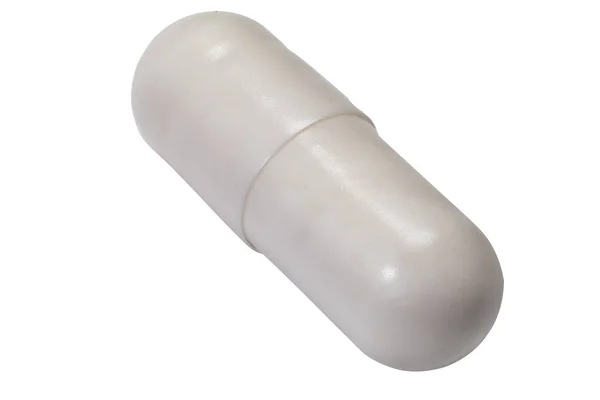 Pílula cápsula extrema macro isolado no fundo branco — Fotografia de Stock