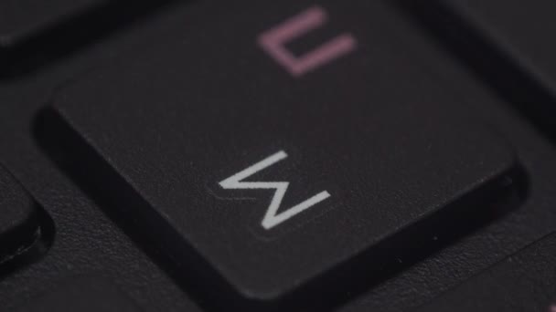 Closeup of a finger pressing a key on a computer keyboard — Stock Video