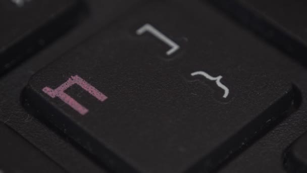 Closeup of a finger pressing a key on a computer keyboard — Stock Video