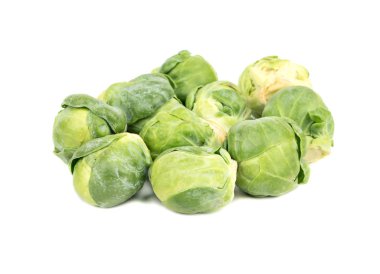 Beyaz bir arka plan üzerinde küçük Demet taze Brüksel lahanası