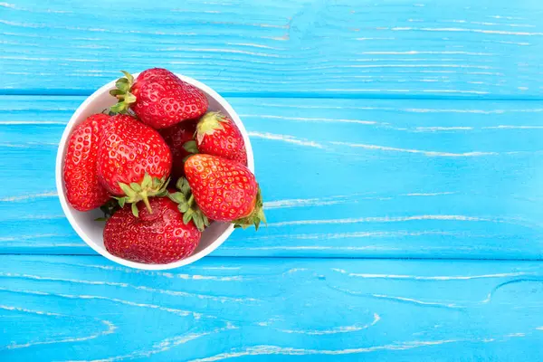 Fresh Strawberries Bowl Blue Wooden Background Top View — Stock Photo, Image