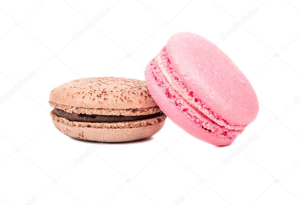 Chocolate and pink macaroon with cream isolated on white background