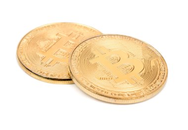 Bitcoins beyaz bir arka plan üzerinde iki altın paralar