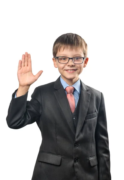 Vrolijke Schooljongen Met Glazen Zwaaien Zijn Hand Een Witte Achtergrond — Stockfoto