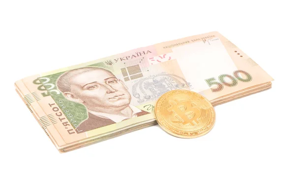 白い背景の Bitcoin コインとウクライナ グリブナのお金 — ストック写真