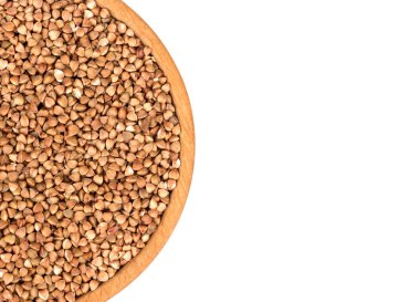 Beyaz arka plan, üstten görünüm üzerinde Ham buğday ile kase parçası