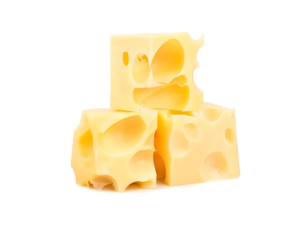 白色背景上有孔的三块奶酪 — 图库照片