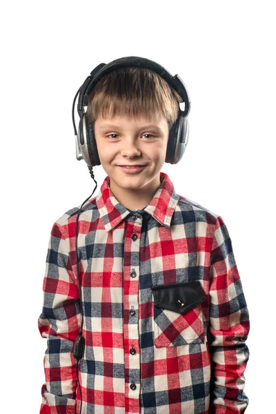 Πορτρέτο Του Ένα Μικρό Αγόρι Ακούτε Μουσική Στα Ακουστικά Λευκό — Φωτογραφία Αρχείου