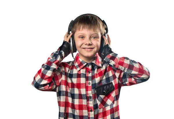 Πορτρέτο Του Ένα Μικρό Αγόρι Ακούτε Μουσική Στα Ακουστικά Λευκό — Φωτογραφία Αρχείου