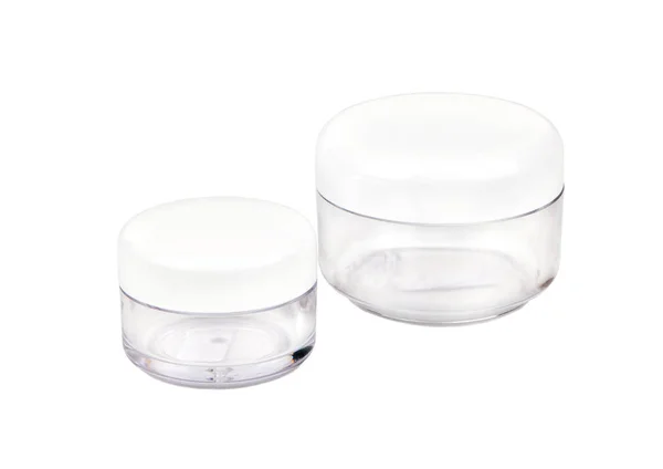 白色背景上的两个空化妆品玻璃罐 — 图库照片
