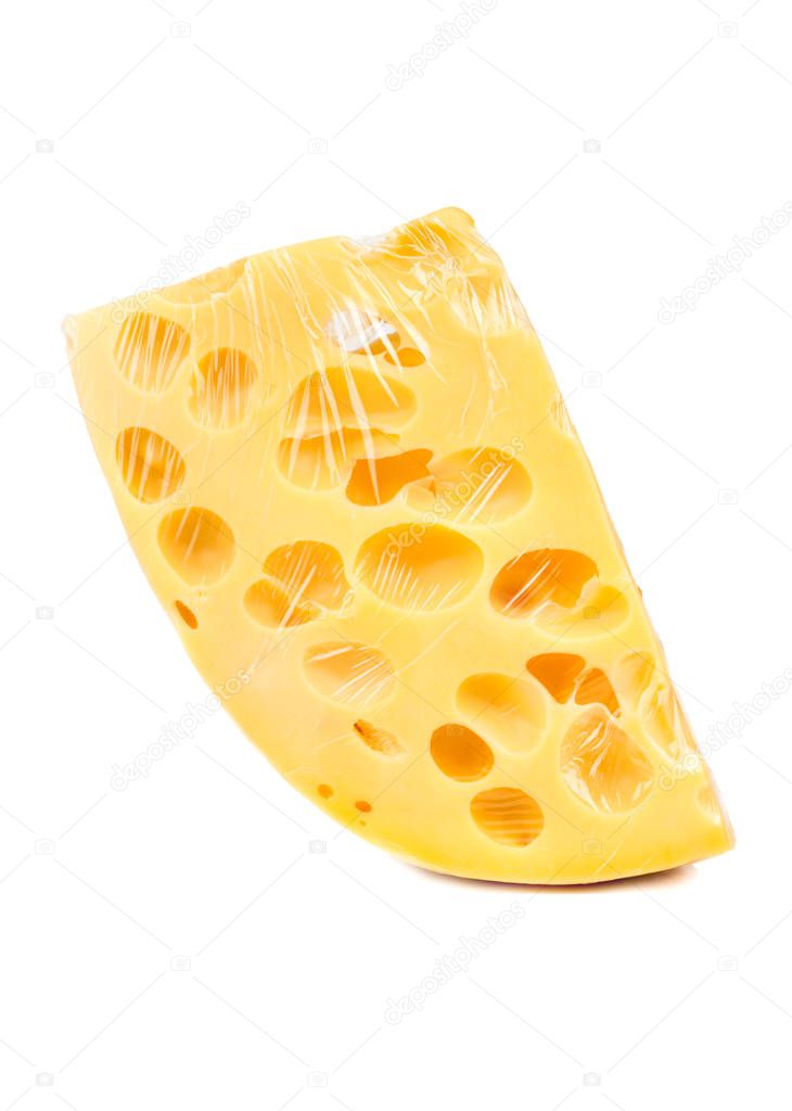 Cheese with holes in vacuum pack on white background