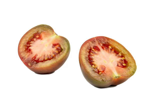 Две половинки помидора кумато — стоковое фото