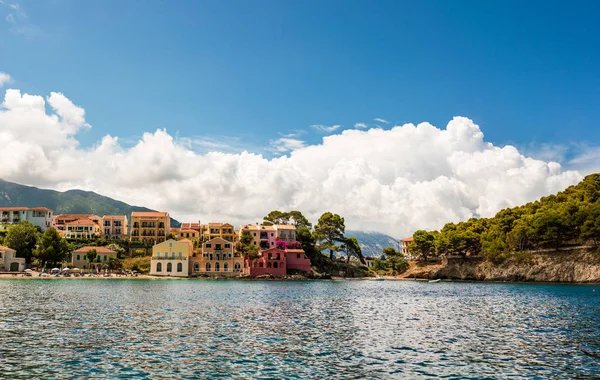 Colorful mediterranean houses on beach in Assos village, Kefalonia island, Greece.