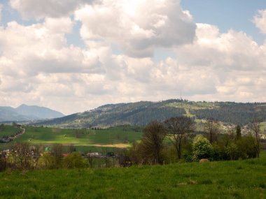 view of the countryside from the hill view of tatra mountains from the top of the Zakopane, Poland.