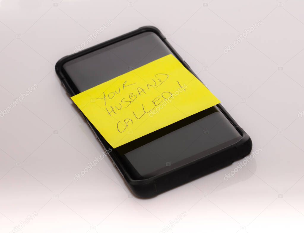 smartphone with a note that signs 