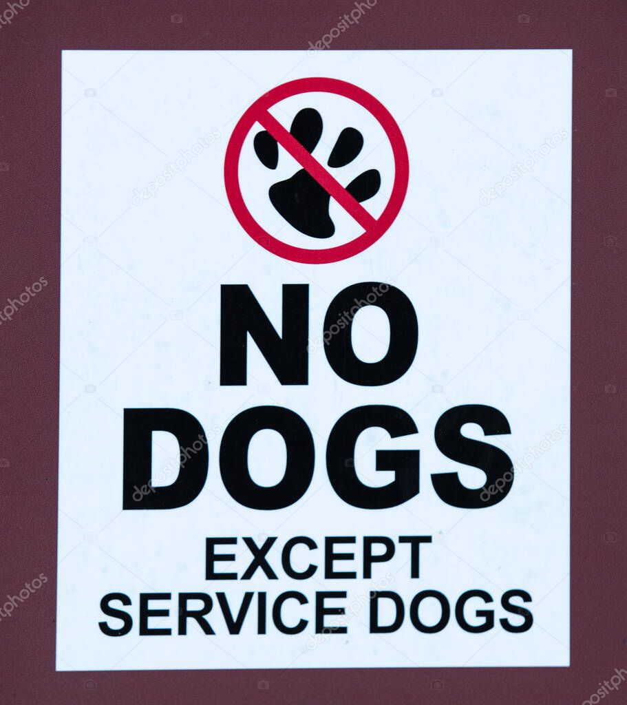 sign says no dogs except service dogs