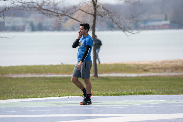 Harrison Township, Michigan / USA - April 19 2020: Michigan Metro Park activity   during the Corona Virus.