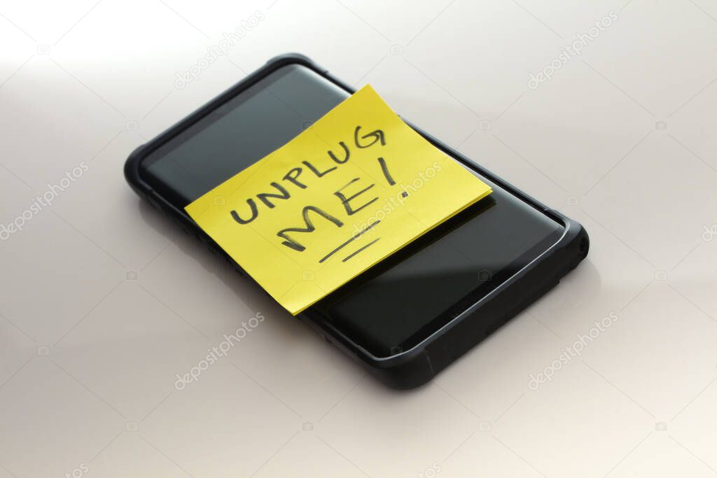 smartphone with a note that says 