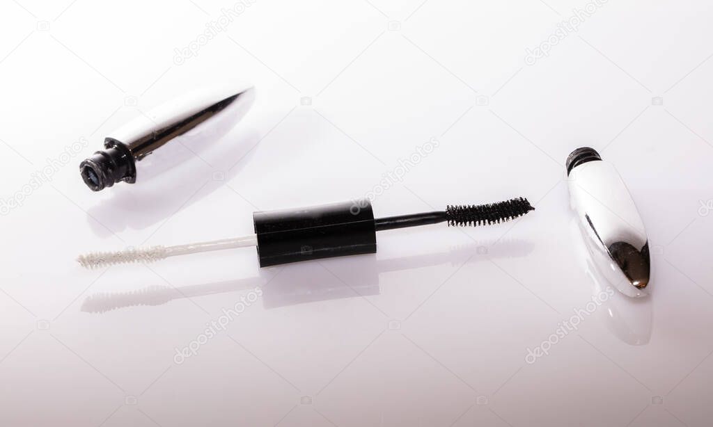 shaving brush in the holder on the white background