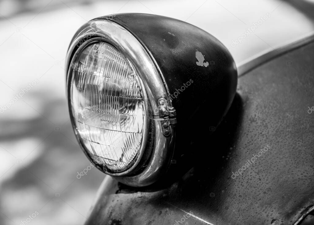 vintage motorcycle-headlight, close-up