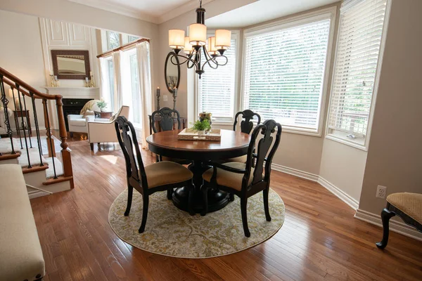 dining room table is empty and waiting for guests to arrive