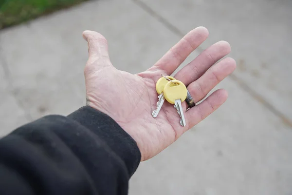 keys in hand are ready to unlock your belongings