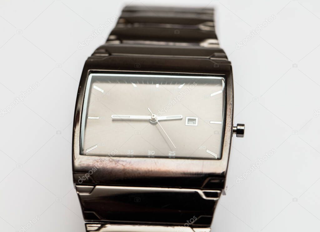 wrist watch with black leather belt