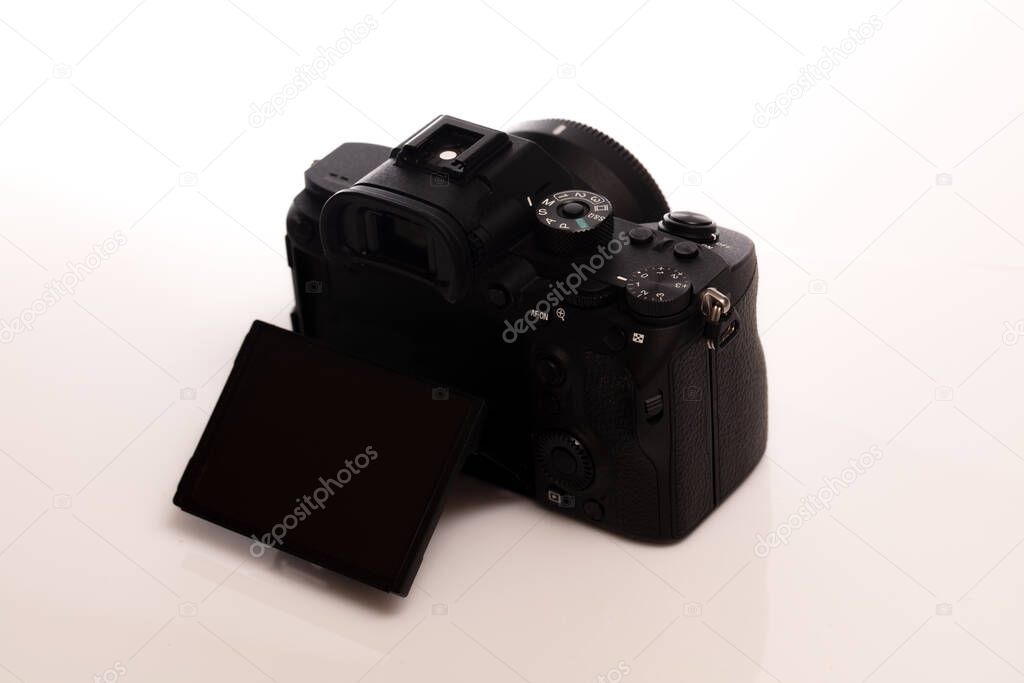 old black leather camera on white background