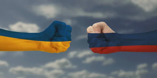 人々の闘争の概念 両手を拳に握りしめ 国旗の色で描かれる ウクライナVsロシア ストックフォト