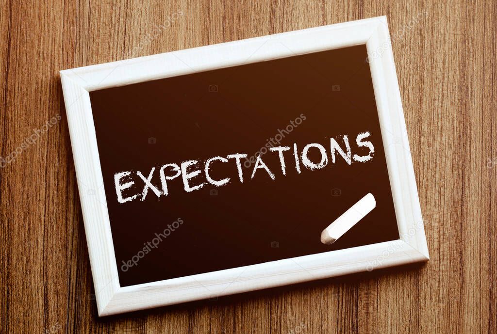 EXPECTATIONS. Hand writing with copyspace for text. Nice texture.