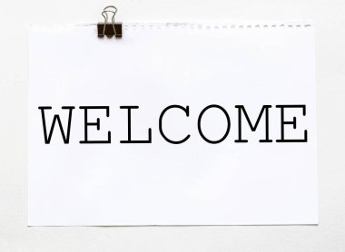 beyaz kağıt ile metin ile beyaz arkaplan kırtasiye ile hoş geldiniz