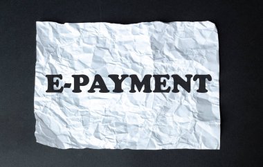 beyaz arkaplanda E-PAYMENT yazılı siyah hesap makinesi