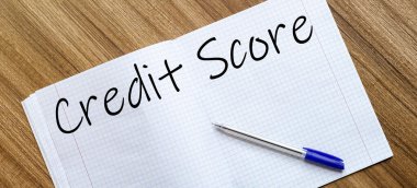 Boş defter ve kalem. Beyazda izole edilmiş. whith metin Kredi Puanı