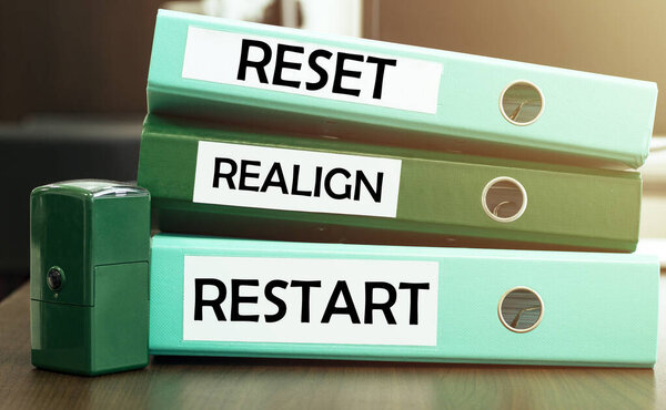 3 green office folders with text Reset Realign Restart