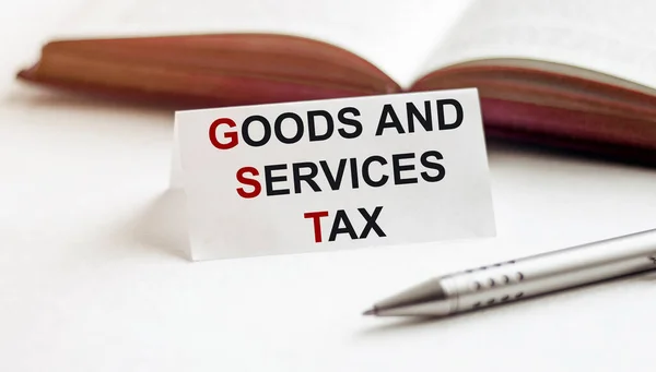 背景为书 白色背景为Gst Goods和Services Tax文本 — 图库照片