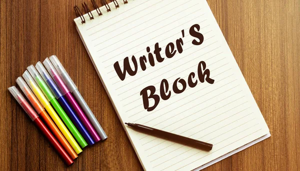 Writer S Block. your future target searching, a marker, pen, three colored pencils and a notebook for writing