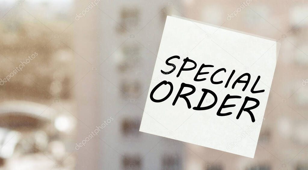 white paper with text Special Order on the window