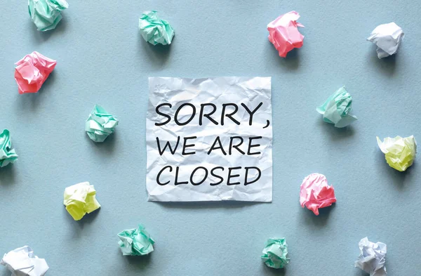 White Paper Text Sorry Closed Blue Background Lot Another Paper — Stock Photo, Image