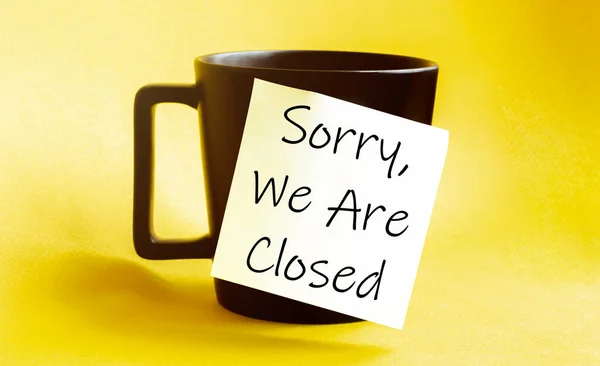 White Paper Text Sorry Closed Black Cup — Stock Photo, Image