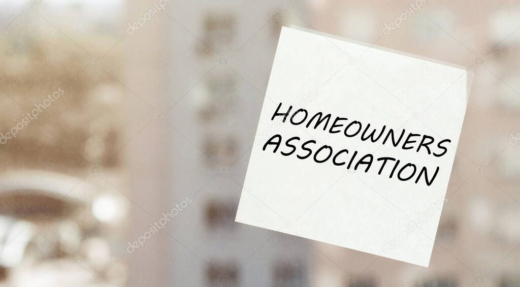 white paper with text Homeowners Association on the window