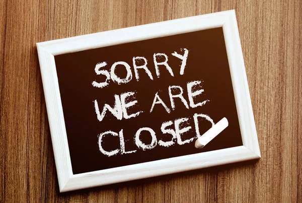 Sorry, We Are Closed. Hand writing with copyspace for text. Nice texture.